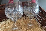A pair of crystal brandy glasses/snifters.