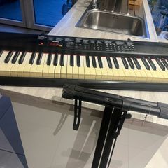 electric keyboard with stand