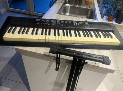 electric keyboard with stand