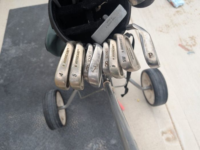 Cheap set of golf clubs and trolley