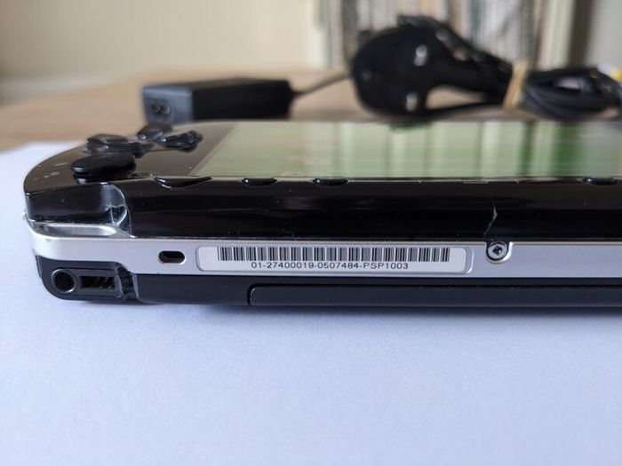 PSP original console with charger and battery