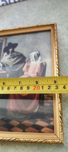 2 framed art work- 1- Vermeer's The Glass of Wine Fine Art Print -  Classic Wall Decor . 25.00euro.2- Helmsley Yorksire Colin Williamson Watercolour 35.00 euro.
