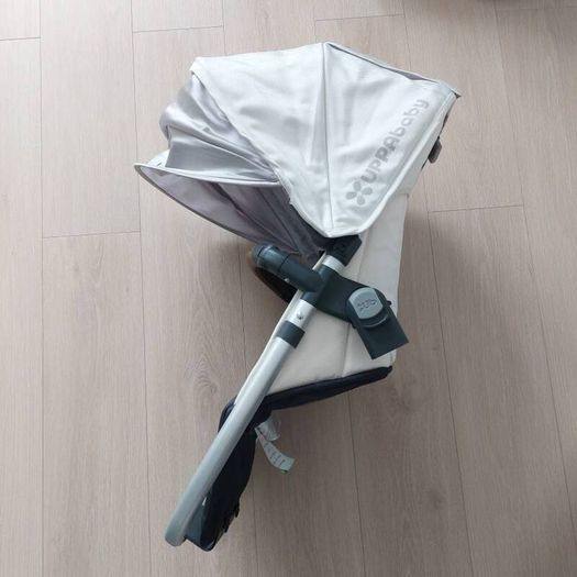 Uppababy rumble seat with rain cover