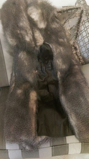 Fur leather coat.New.size 10