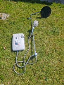 Electric shower with rain shower fitting.