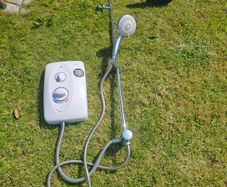 Electric shower with rain shower fitting.