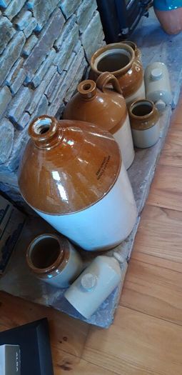 Collection of Eight Antique Stoneware Jars including Two Antique Hot Water Bottles