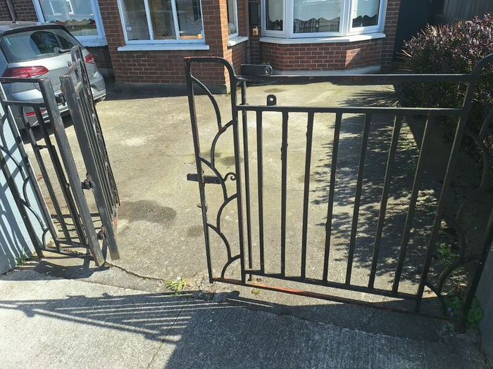 Black wrought iron mdtal double garden gates