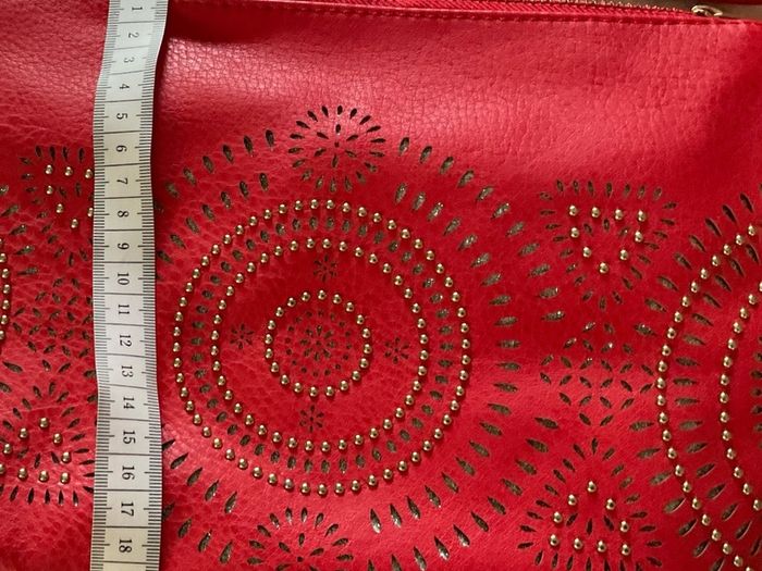 Never used  Red/ dark orange colour with gold beads and silver glitter details