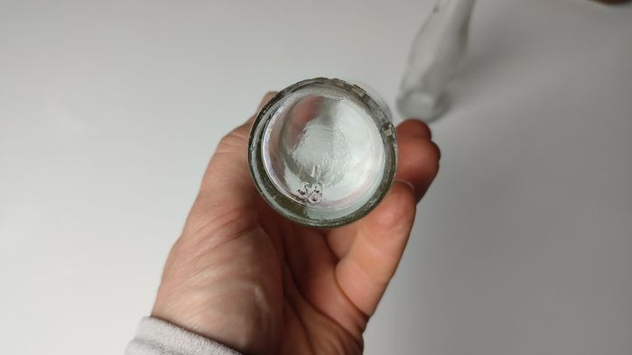 385 - Set of 2 Vintage Collectible Decorative Clear Glass Cantrell and Cochrane Mineral Bottles