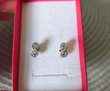 Silver earrings infinity sign