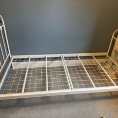 white metal frame bed