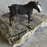 Small horse on chipped  green marble plinth from Co Mayo MULRANNY 1970 . Image 7