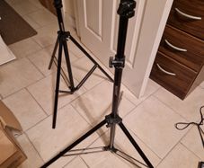 NEEWER, 2 Photography Tripods and feet and also 5ft circular Silver Light enhancer all in new condition and in lovely cases
