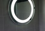 Bathroom light with demister