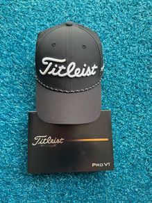 12 ProV1 and Titleist Tour Breezer Hat