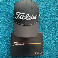 12 ProV1 and Titleist Tour Breezer Hat