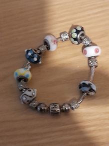 Pandora Charm bracelet  steerling silver as  new