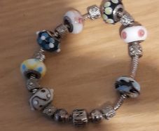 Pandora Charm bracelet  steerling silver as  new