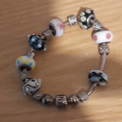 Pandora Charm bracelet  steerling silver as  new