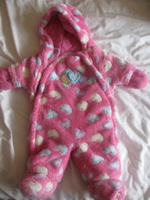 Cute all in one snow suit.