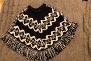 Poncho 5-6 years old Like new