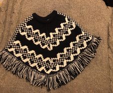 Poncho 5-6 years old Like new