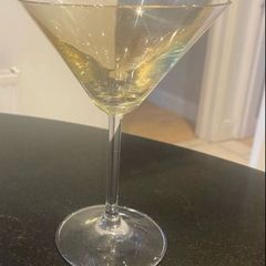 Set of four amber and plain glass martini or cocktail glasses