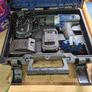 brand new cordless drill with 2 batteries, a charger, and carry case. Image 5