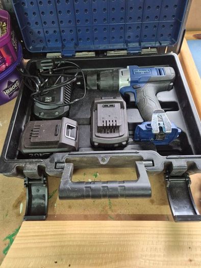 brand new cordless drill with 2 batteries, a charger, and carry case.