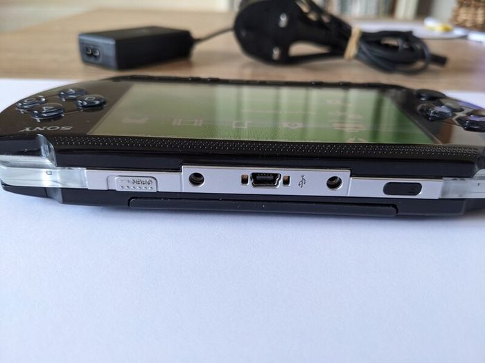 PSP original console with charger and battery