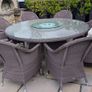 Rattan garden dining set with glass top table and 8 chairs Image 3