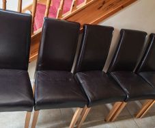5 black chairs