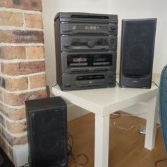 stereo with record player , tape, cd player and radio