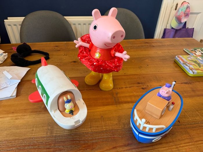 Peppa pig dancing figure, boat and plane.