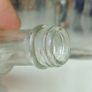 483 - Set of 7 Vintage Clear Glass Screw Cork Top Collectible Decorative Bottles Image 10
