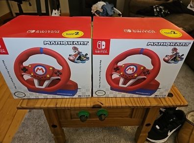 Switch Maori Mario Kart branded racing wheel with pedals.