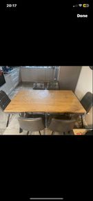 oak dining table with 6 grey leather chairs   in good condition, with no flaws .. no delivery available / only collection ..