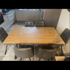 oak dining table with 6 grey leather chairs   in good condition, with no flaws .. no delivery available / only collection ..