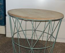 Side table with storage basket