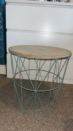 Side table with storage basket