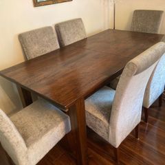 Rosewood dining table and six chairs