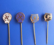 SELLIER & BELLOT (ammunition manufacturer) - four vintage promotional badges (1960s / 1970s)