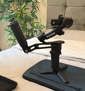 DJI RS 3 Mini with DJI Briefcase Handle and a bag