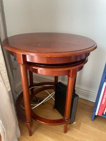 Two wooden nesting tables