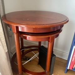 Two wooden nesting tables