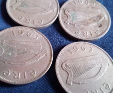Irish Sixpence coins.