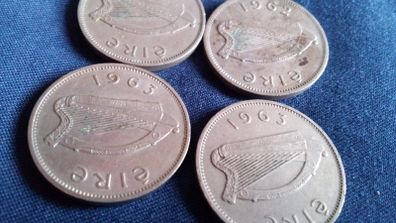 Irish Sixpence coins.