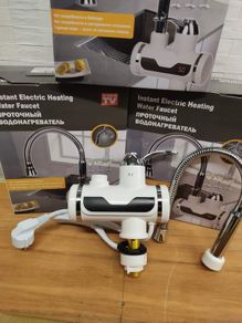Instant heating hot water tap