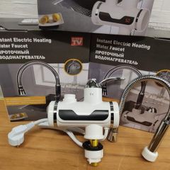 Instant heating hot water tap